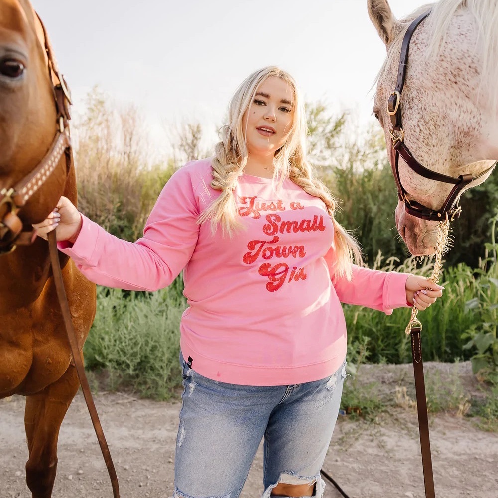 JUST A SMALL TOWN GIRL GRAPHIC SWEATSHIRT